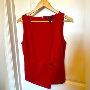 White House Black Market size 6 red sleeveless knit top. Flattering asymmetrical